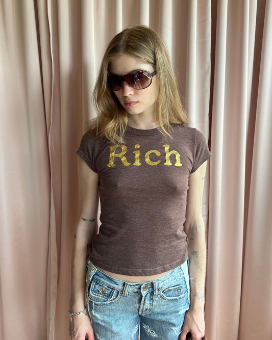 "Rich" Gold Glitter Spell Out Baby Tee