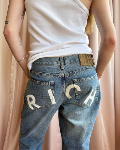 Richmond Denim “RICH” White Spell Out Flare Leg Jeans