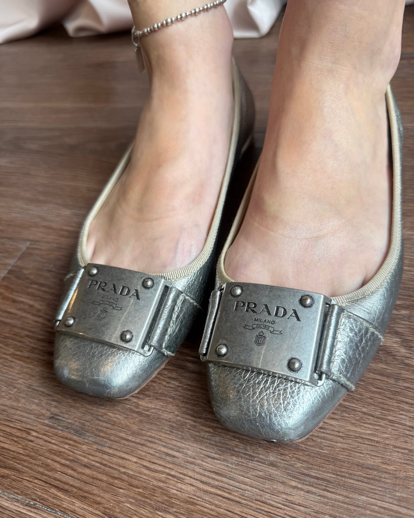 Prada Logo Buckle Silver Metallic Leather Flats